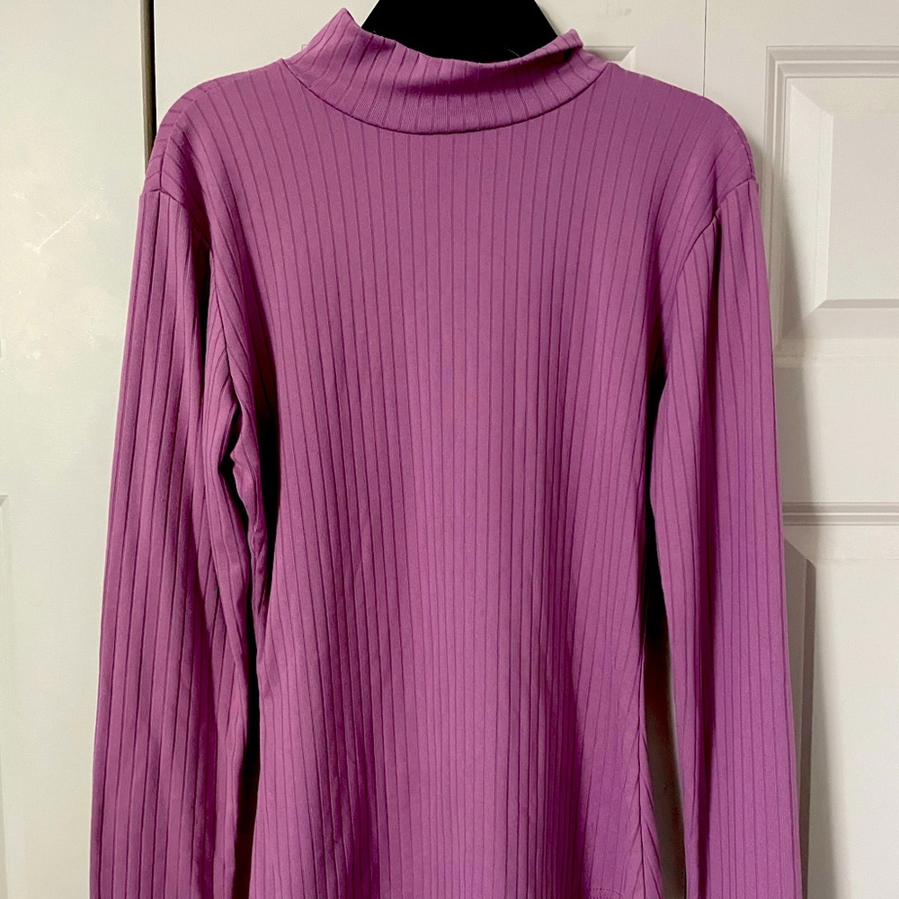 Purple turtle neck.